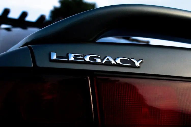 A car bumper, with 'LEGACY' written on it.