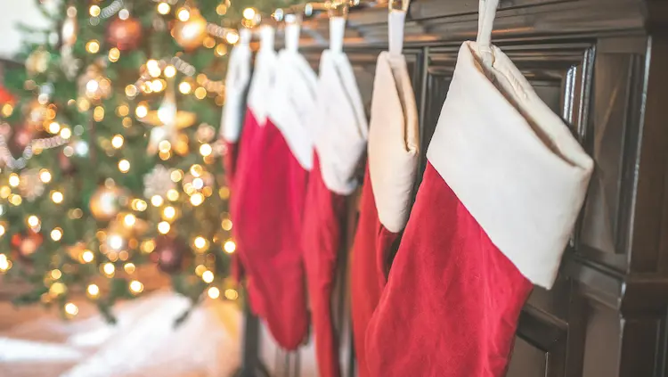 Stockings hung on a mantel.