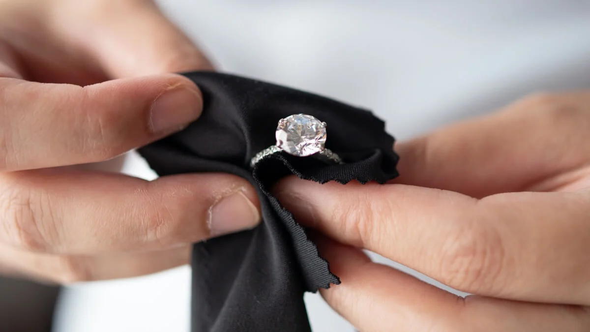 Cleaning a diamond ring.