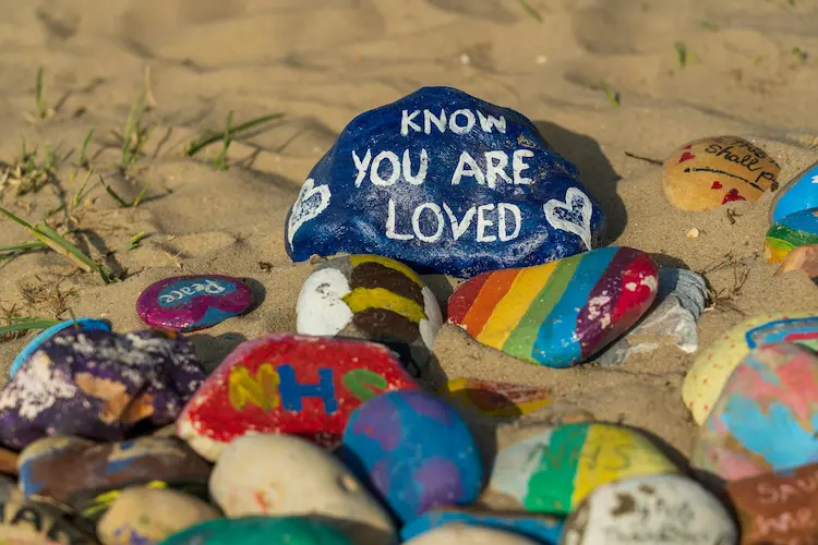 Painted stones on the beach.