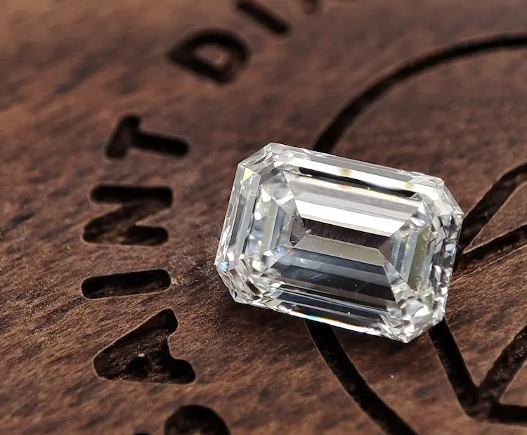 Colorless emerald cut memorial diamond.