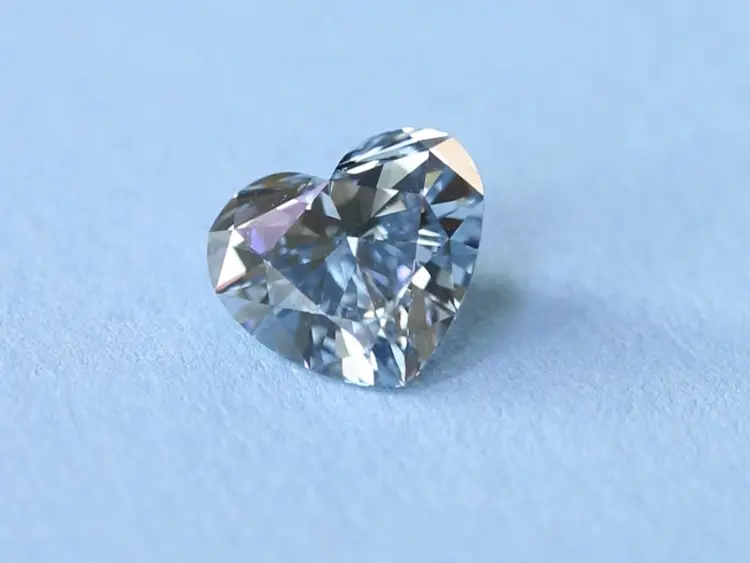 Blue heart-cut memorial diamond.