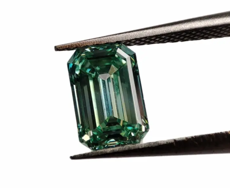 Green emerald cut memorial diamond.