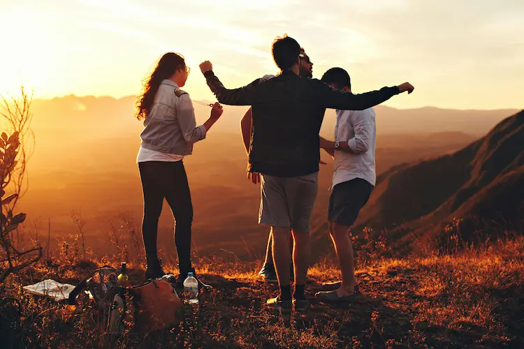 A friend group celebrating in the nature.