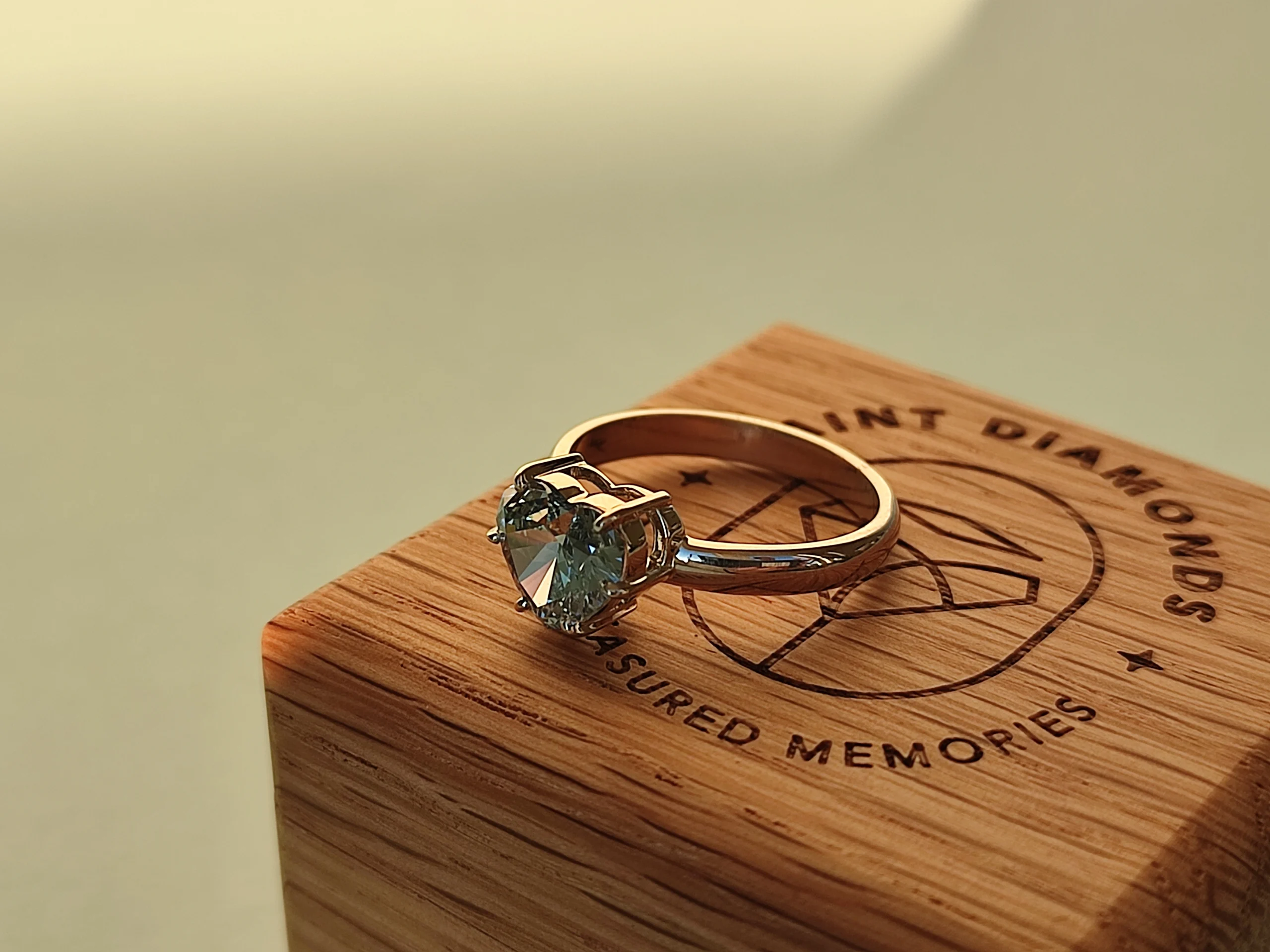 Heart shape cremation diamond ring on a jewelry box